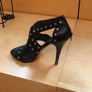 Black stiletto peep-toe heel.w/ gold stud rivets